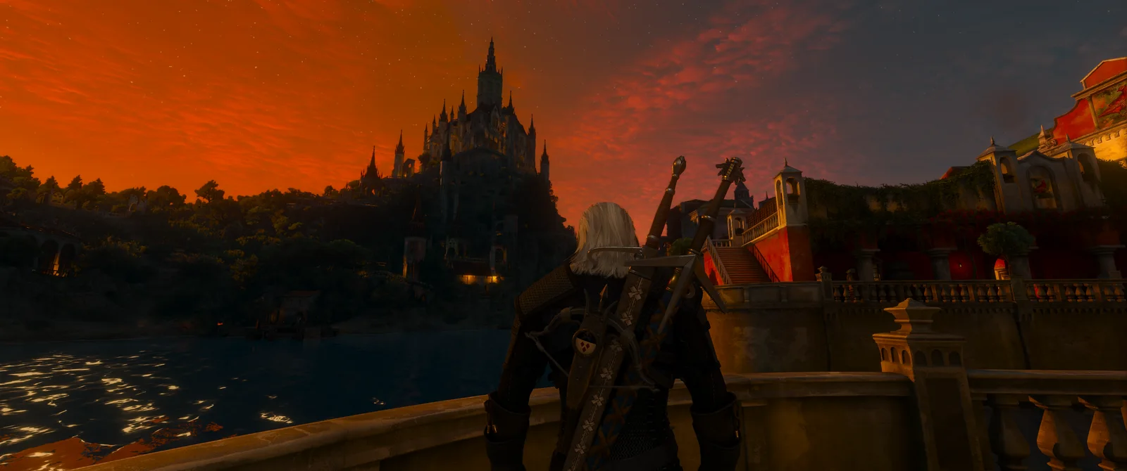 Riverfront and castle at sunset