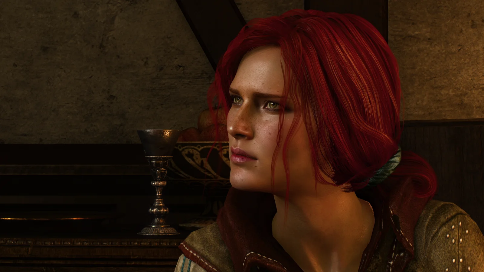 Side profile beside a goblet